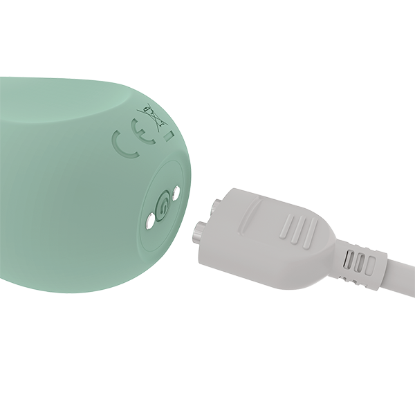 Love yourself with this pale green triangular egg shaped clitoral vibrator. Base includes one power control button and two magnetic charging pieces. White magnetic charging cord included.
