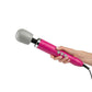 Hand holding pink wand with gray domed head and three gray buttons with black cord. The unparalleled power makes this one of the best sex toys available.
