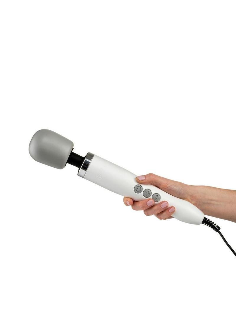 Hand holding white wand with gray domed head and three gray buttons with black cord. The unparalleled power makes this one of the best sex toys available.