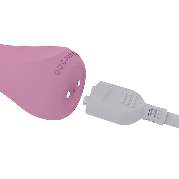 Small pale pink bullet vibrator great for discreet self-love. Base includes one power control button and two magnets for charging. White magnetic charging cord included.