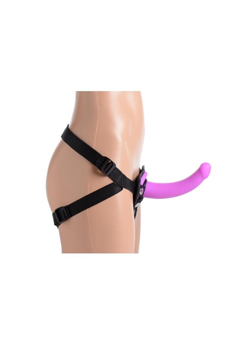 Black adjustable straps with triangular piece at the front that secures a small purple silicone dildo