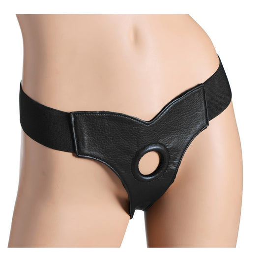 Black stretchy harness with triangular piece at the front with a hole to secure a dildo.