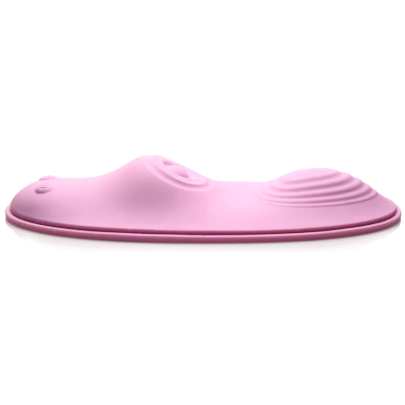 Pink saddle-like pad with two humps for grinding. One mound is ribbed and the pulsing clit stimulator on the other mound. Two small buttons on one end. Love yourself with this amazing sex toy.