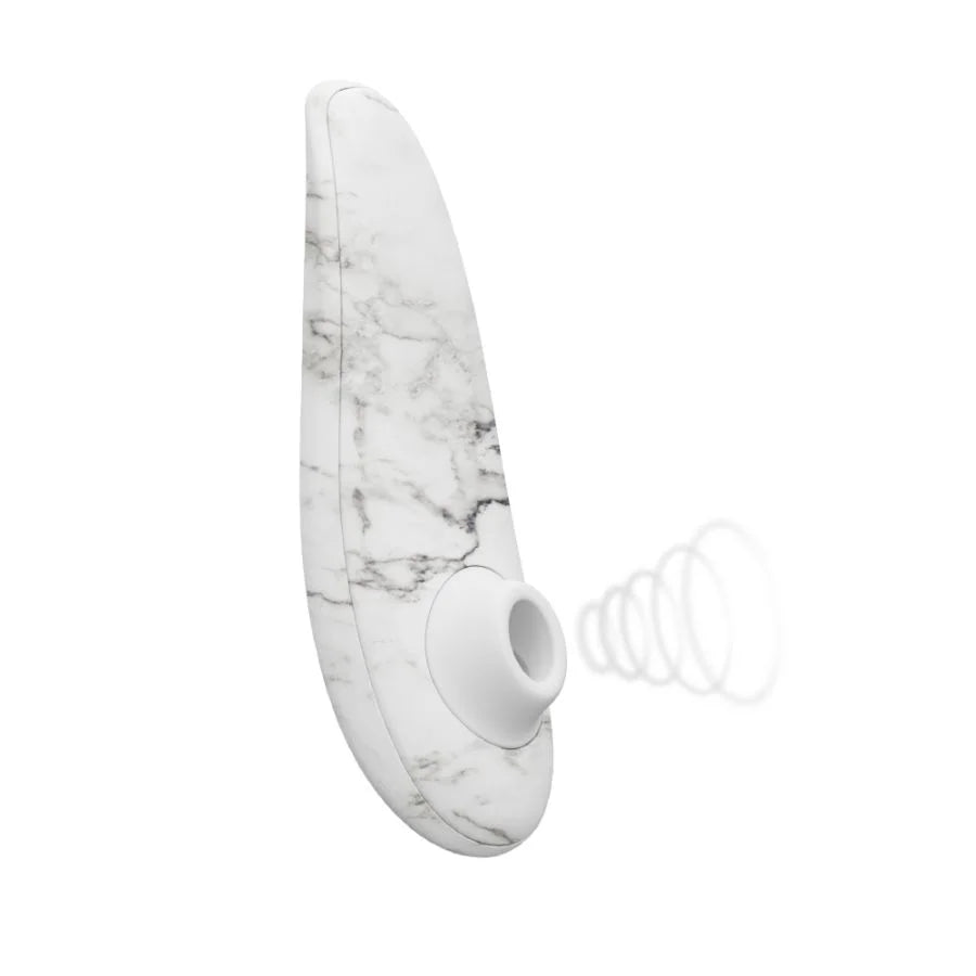 white marble clitoral stimulator with oval shaped opening with sonic waves radiating out.