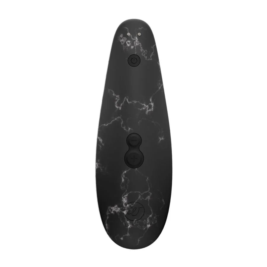 black marble clitoral stimulator with three buttons on back.