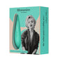 mint clitoral stimulator in beige and mint box with Marilyn Monroe pictured.