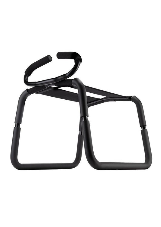 black framed stool with two black straps along the top to sit on with an opening between them for penetration. One end has handles with foam covers for comfort. One of the best sex toys for couples.